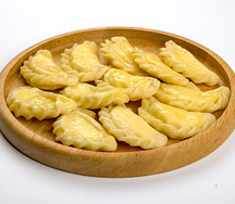 Вареники с квашеной капустой и шкварками L