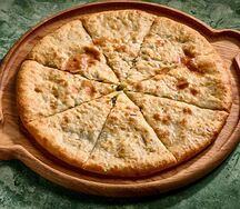 Осетинский пирог с сыром и зеленью  