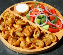Пельмени жареные 