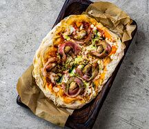 Пицца с беконом и грибами под ореховым соусом