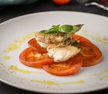 Судак с помидорами 