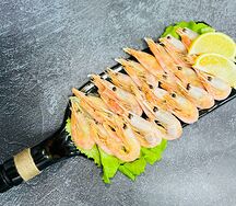 Жареные креветки в соусе том ям 