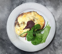 Отбивная из говядины под сырной шапкой