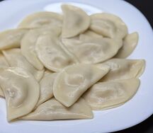 Отварные вареники с картофелем и грибами 