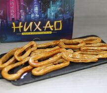 Копченый кальмар в остром соусе