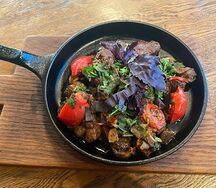 Куриные потрошка с помидорами