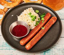 Колбаски из баранины с квашеной капустой и брусничным соусом