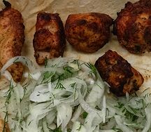 Куриные бёдрышки без кости на углях