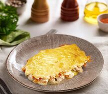 Куриное филе под сырно-овощной шубкой