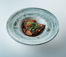 Томленая телятина в мясном соусе