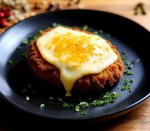 Котлета из свинины, запечённая с сыром