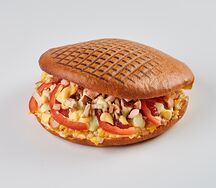 Много сыра в лепешке