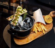 Мидии в створках в соусе