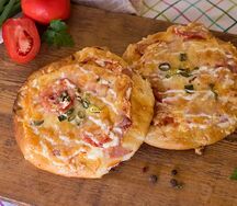 Пицца с ветчиной и сыром 