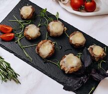 Шампиньоны, запеченные под сыром