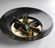 Мидии в соусе дорблю