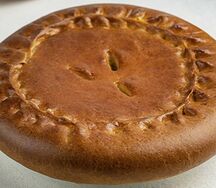 Пирог с белой рыбой и овощами