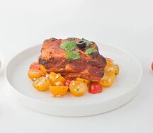 Свиные ребра с томатами черри