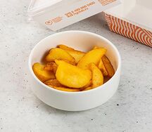 Дольки печёного картофеля