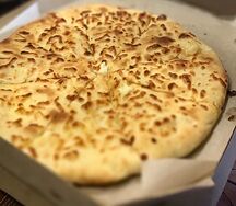 Осетинский пирог с сыром и зеленью