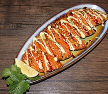 Запечённые мидии в сырном соусе