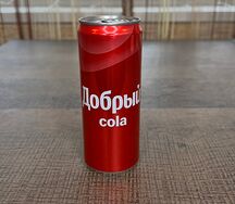 Добрый Cola в жестяной банке