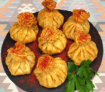 Жареные хинкали с сыром и грибами