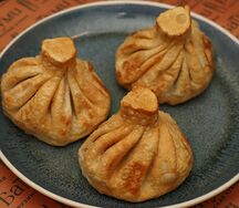 Жареные хинкали с грибами и сыром