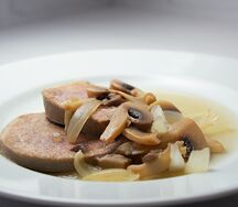 Язык говяжий в грибном соусе