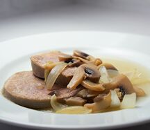 Язык говяжий в грибном соусе