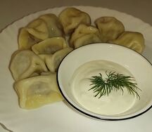 Пельмени со свининой и говядиной отварные