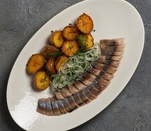 Сельдь с пряным картофелем