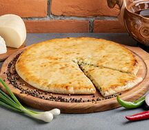 Осетинский пирог с сыром и зеленым луком