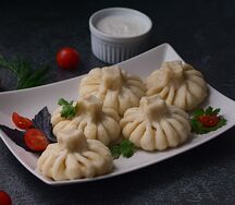 ХИНКАЛИ С КУРОЧКОЙ