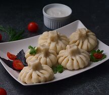 ХИНКАЛИ С СУЛУГУНИ И МОЦАРЕЛЛОЙ