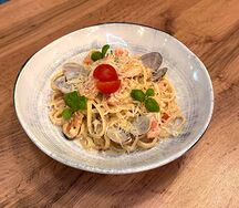 С морепродуктами в соусе том ям