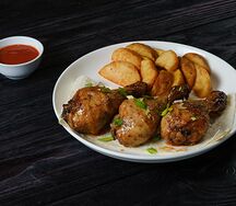 Куриные ножки и картофель по-деревенски