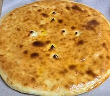 Пирог с филе цыплёнка и осетинским сыром 
