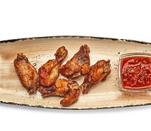 Куриные крылья фри с острым соусом Red hot