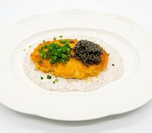 Рыбная котлета с черной икрой и трюфельным соусом