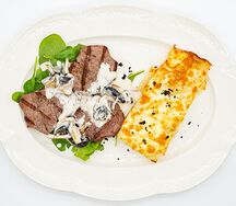 Медальоны с грибами в сливочном соусе с картофельным гратеном