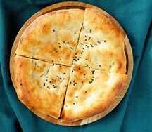 Лепешка собственного приготовления из печи