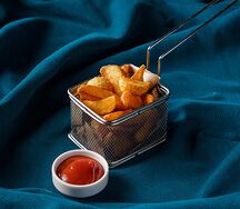 Картофель по-деревенски со специями дольками