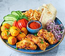 Шашлык из куриного бедра с гарниром