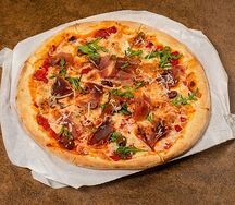Пицца с пармской ветчиной 