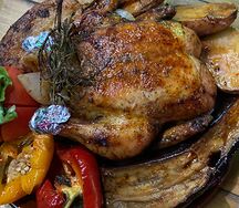 Запеченная курица с печеными овощами
