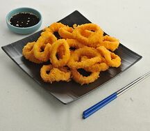 Кольца кальмара в сухарях