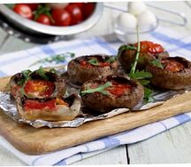 Шампиньоны, запеченные в печке с сыром