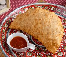 Чебурек с красной рыбой и сыром