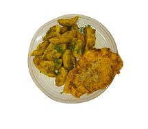 Картофель по-деревенски с куриной отбивной